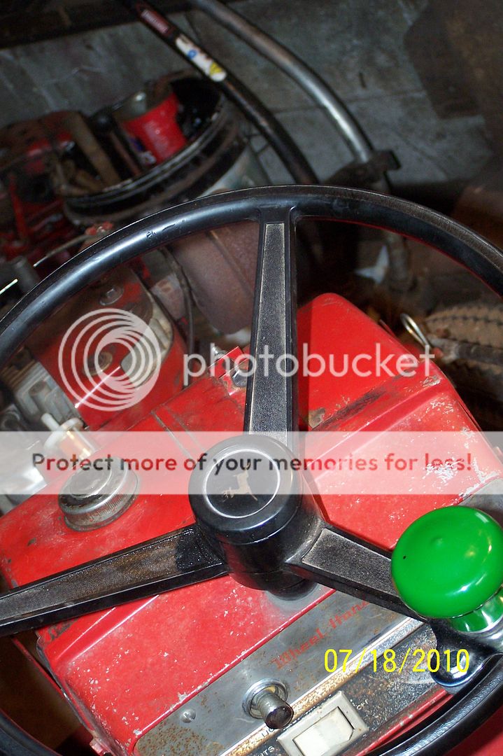 The Wheel Horse vs. John Deere Implements and Attachments RedSquare